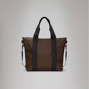 NWT Rains Waterproof Mini Tote Bag with Black Straps in color Frame